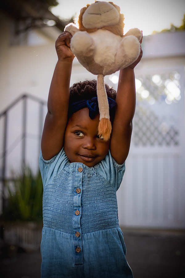girl with lion teddy